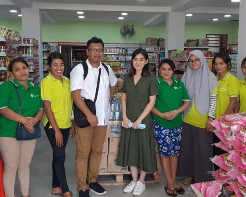 Take a picture with Mrs. Rita (Beta Mart Owner) and all staff
